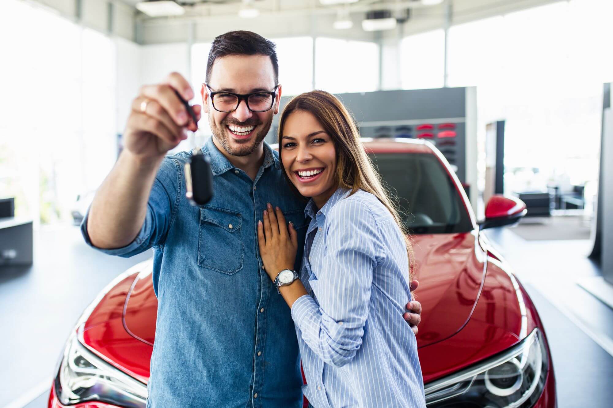 A happy couple who saved money on their Auto Insurance in Miami, Florida